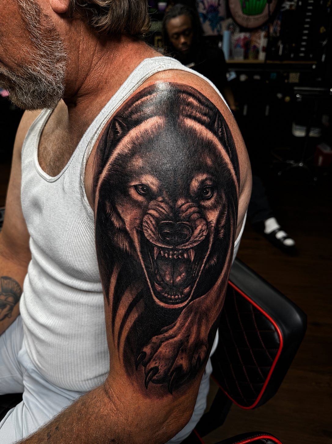 Fierce Wolf Shoulder Tattoo by Boneface