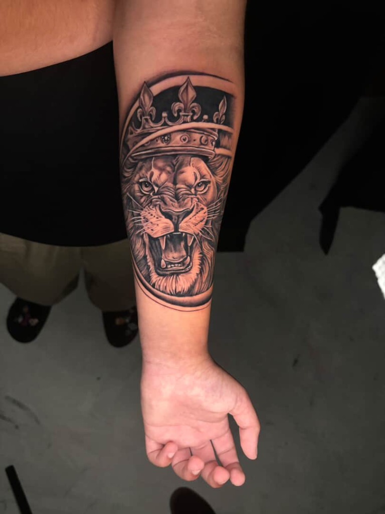 Crowned Lion Realism Tattoo by Drope